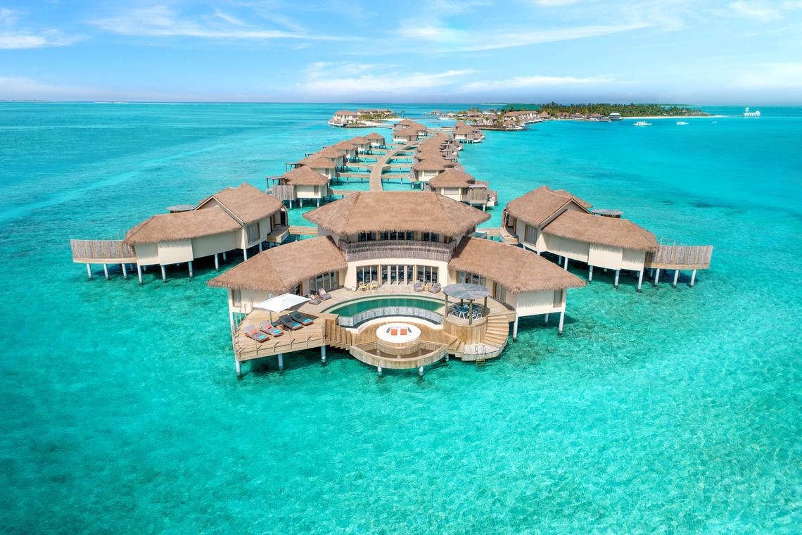 intercontinental maamunaga maldives aerial resort front overwater bunalows
